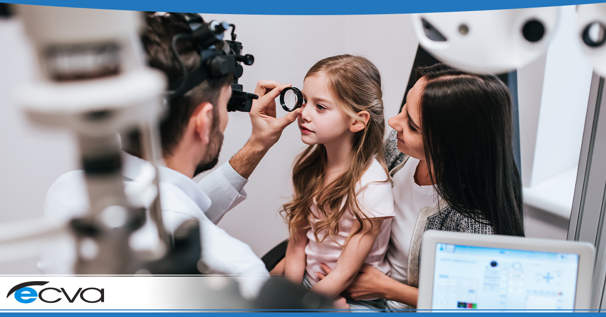 child receiving an eye exam